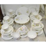 A Richmond Wild Anemone pattern part tea service, comprising of cake stand, bread and butter plate,