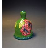 A Moorcroft hibiscus pattern bell, green ground,