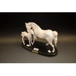 A Royal Doulton equine group, of a horse and foal,