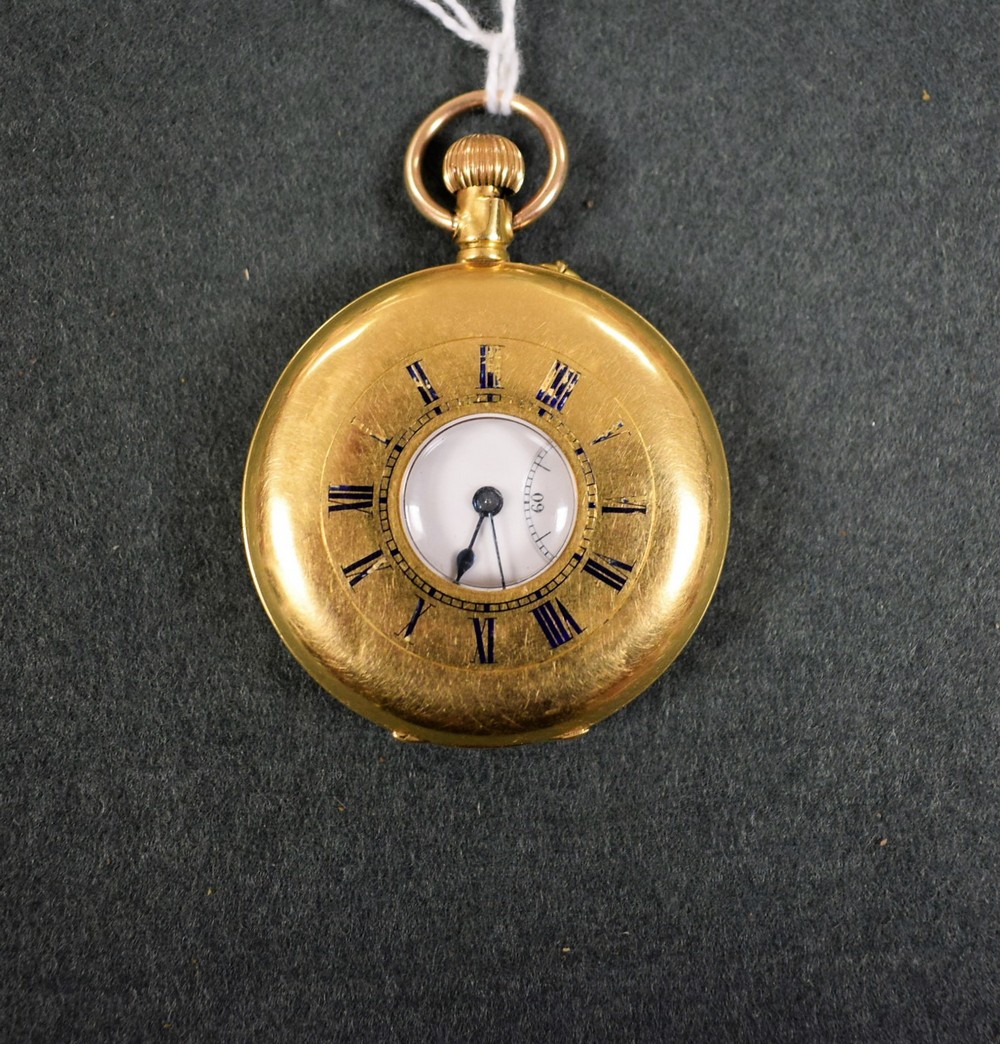 An 18k gold half hunter pocket watch, white enamel dial, Roman numerals, subsidiary seconds dial,