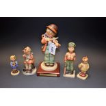 A Goebel figure of a boy playing fiddle, limited edition 180/200, 20cm high; others,