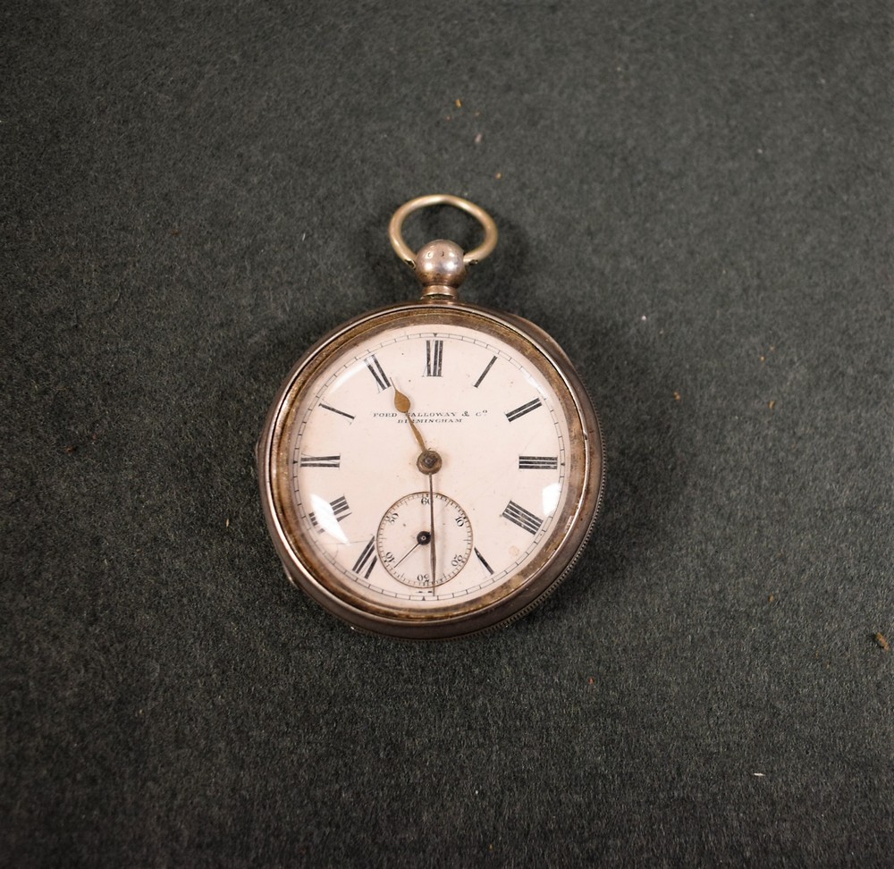 A silver pocket watch, Ford and Galloway,