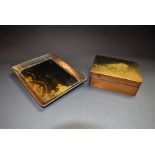 A Japanese lacquer rounded rectangular box and cover, decorated in hiramakie with flowers,