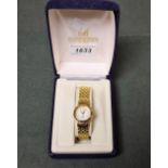 A Givenchy lady's wristwatch, yellow metal,