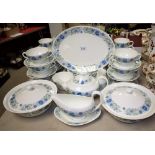 A Wedgwood Clementine pattern part dinner and tea service comprising salad plates, side plates,