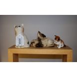 A Beswick group, of Siamese cats, printed marks; another, single cat; a Royal Doulton model,