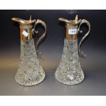 A pair of 19th century style Gainsborough cut glass claret jugs