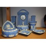 Wedgwood Japserware - mantel garniture, comprising clock and candlesticks,