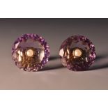 A pair of amethyst and seed pearl earrings, each with dished circular disc,