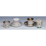 A Swansea cabinet cup, the interior decorated with cartouches of colourful summer flowers,