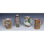 A Victorian majolica jug, moulded in relief with two storks, amongst reeds, in tones of pink,