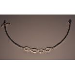 A contemporary lady's 18ct white gold and diamond bracelet,