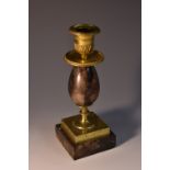 A Derbyshire Blue John and ormolu candlestick, egg-shaped column, reeded nozzles with lotus border,