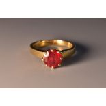 A solitaire ruby ring, round cut red ruby approx 1.