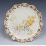 A Royal Doulton shaped circular plate, painted by David Dewsberry, signed with wild flowers,