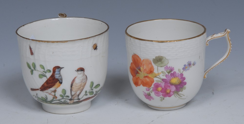 A Meissen spirally moulded coffee cup, painted with two birds, ozier moulded border,
