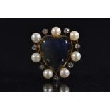 A labradorite diamond and pearl heart pendant brooch, central heart cut cabochon labradorite,
