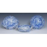 A Spode Italian pattern shaped two handled basket and oval stand, in relief with basketwork,