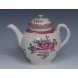 An English porcelain globular teapot and cover, painted with stylised flowers,