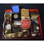 A box of watch parts, medallions, etc.