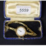 A lady's 9ct gold cased wristwatch, rolled gold expanding bracelet , strap,
