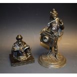 A bronzed spelter figure of classical dressed figure with camera shaped spill holder, 18.