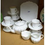 Ceramics - a Shelley Dainty White tea service to include seven cups and saucers, eleven side plates,