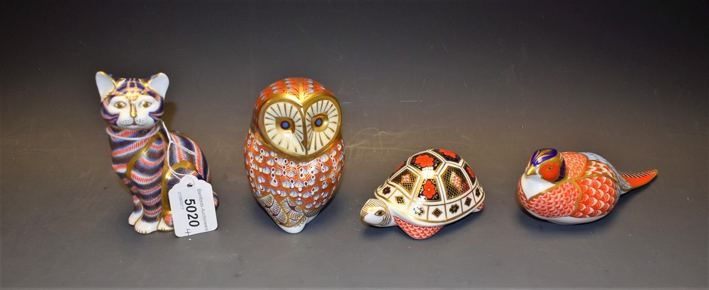 A Royal Crown Derby paperweight Owl, silver stopper, second quality; three others, Pheasant,