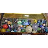 A tin of old marbles