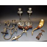 A pair of chrome candlesticks; a metal mounted horn; a novelty dolphin bottle opener; corkscrew;