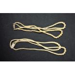 A graduated simulated pearl double strand necklace, 39cm long; another similar 38cm long,