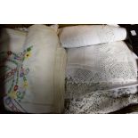 Textiles - lace edged linen, embroidered cloths, table cloths,