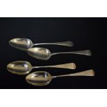 A pair of George III silver serving spoons, London 1810; others,