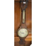An early 19th century rosewood wheel barometer, silvered register inscribed J Levy, Gainsborough, c.