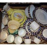 Ceramics - a Pareek tea set, yellow band, floral pattern on a cream ground,