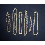 A quantity of gold chains, to include rope twist, curb chains, etc.; total weight approx.
