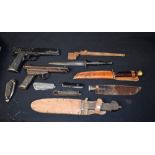 An air pistol, FC Clarke, The Warrior; an air pistol,