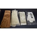 A quantity of evening gloves to include white kid leather, long and elbow length gloves,