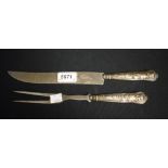 A silver hafted Kings pattern carving knife and two prong fork