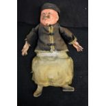 An unusual papier mache Chinaman doll, in traditional dress,