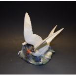 A Royal Crown Derby Tern, on cresting wave, gloss glaze, printed marks, 16cm high, first quality,