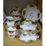 A Royal Albert Old Country Rose pattern tea set including two tier cake stand, cups,
