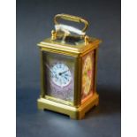 A French miniature gilt brass carriage clock,