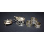 A silver mustard pot, Birmingham 1903; another, similar; others, napkin rings,