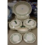 A Royal Doulton Almond Willow pattern dinner service for six comprising dinner plates, salad plates,