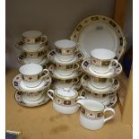 A Royal Crown Derby Border pattern tea set, comprising eleven teacups, twelve saucers,
