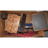 A box of early 20th century games and puzzles