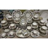 A comprehensive Crown Staffordshire Hunting Scene pattern dinner, coffee and tea service,