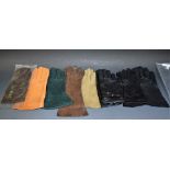 A quantity of leather gloves to include kid leather, silk lined' German hand stitched,