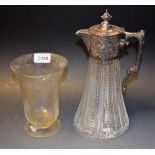 An Edwardian style clear glass claret jug, silver plated mount and handle,